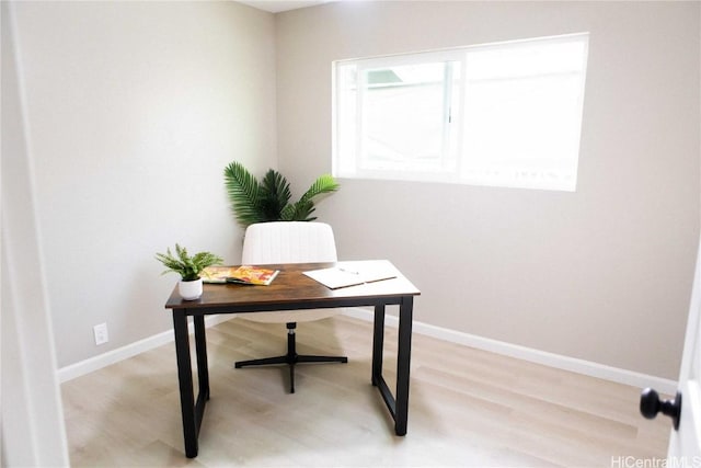 home office featuring light hardwood / wood-style flooring