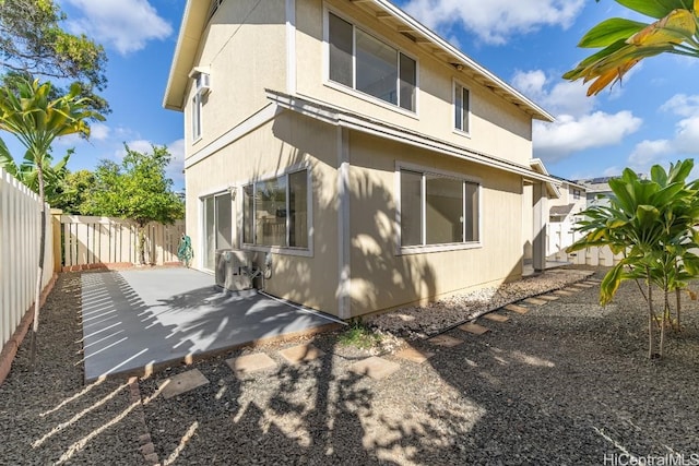 rear view of house featuring a patio