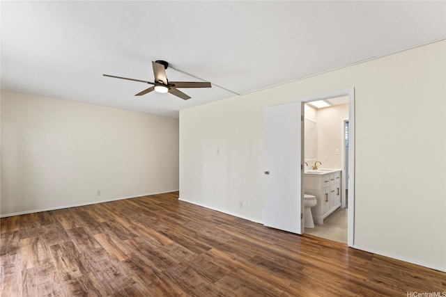2875 S King St Unit 209, Honolulu, HI 96826 - unfurnished room featuring a ceiling fan, wood finished floors, and a sink