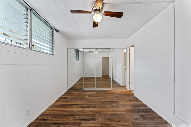 hallway featuring dark hardwood / wood-style flooring