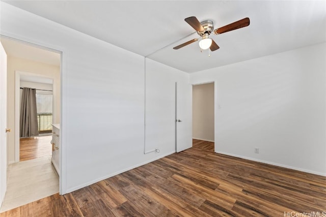 spare room featuring ceiling fan and hardwood / wood-style floors