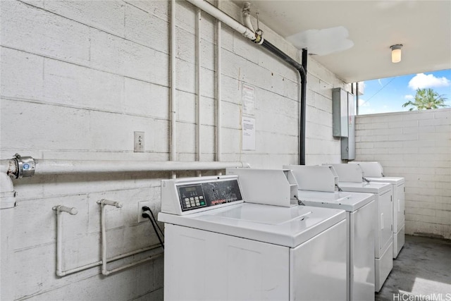 washroom with washing machine and clothes dryer