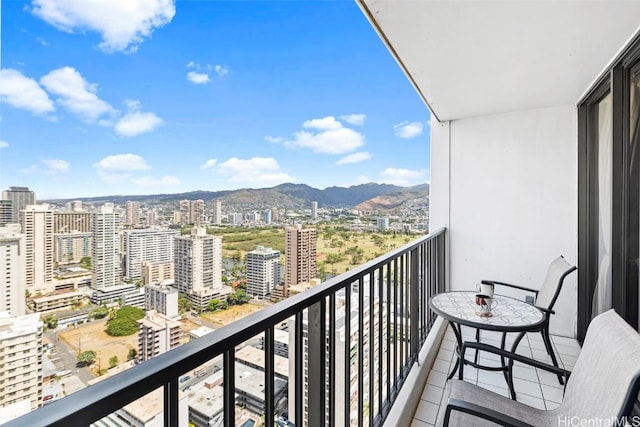 balcony featuring a mountain view