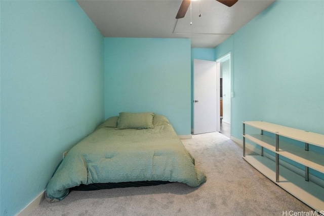 bedroom with ceiling fan and carpet