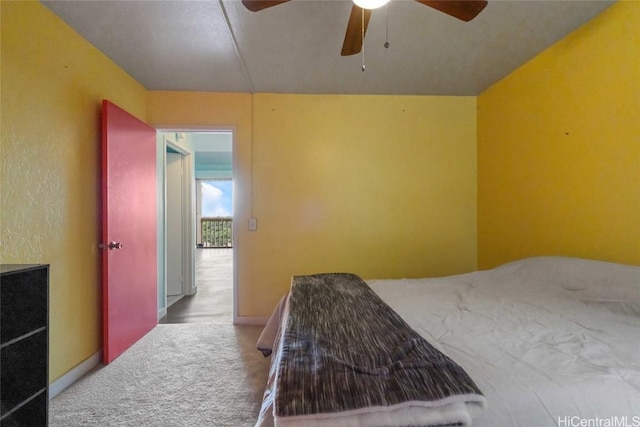 bedroom featuring ceiling fan and carpet flooring