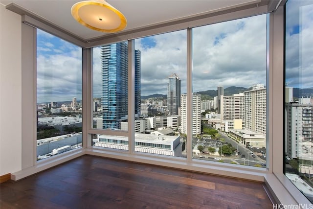 interior space with floor to ceiling windows and a healthy amount of sunlight