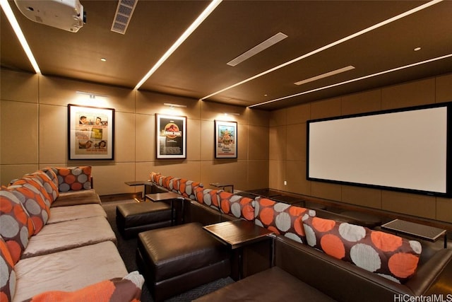 home theater with tile walls