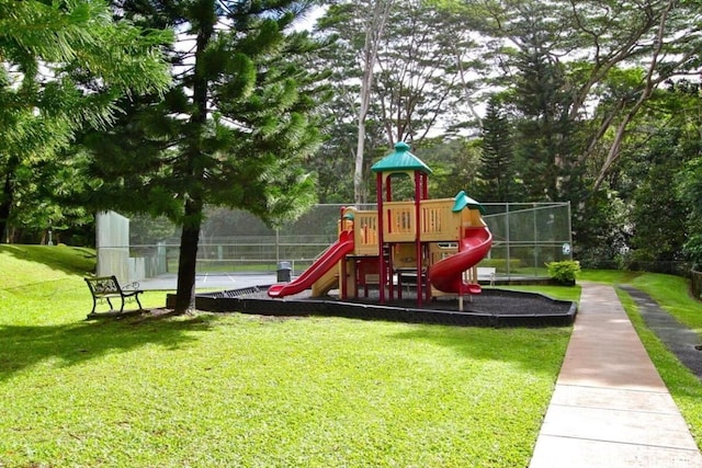 view of play area with a yard