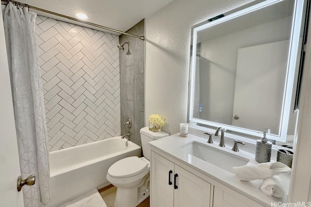 full bathroom with vanity, toilet, and shower / bath combo