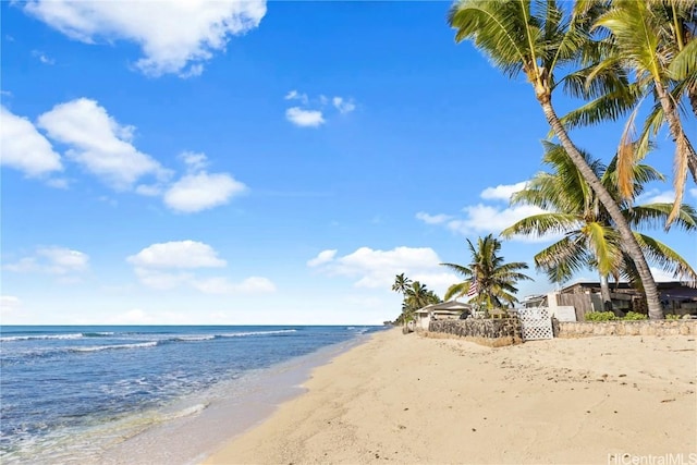 property view of water featuring a beach view