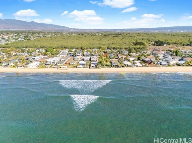 bird's eye view with a water and mountain view and a beach view