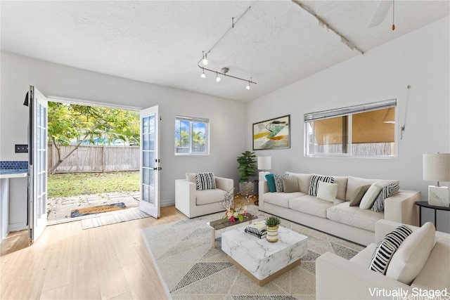 living room with light hardwood / wood-style floors