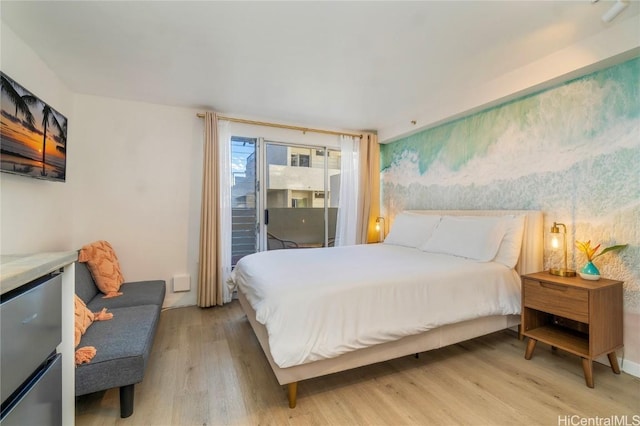 bedroom with light wood-type flooring