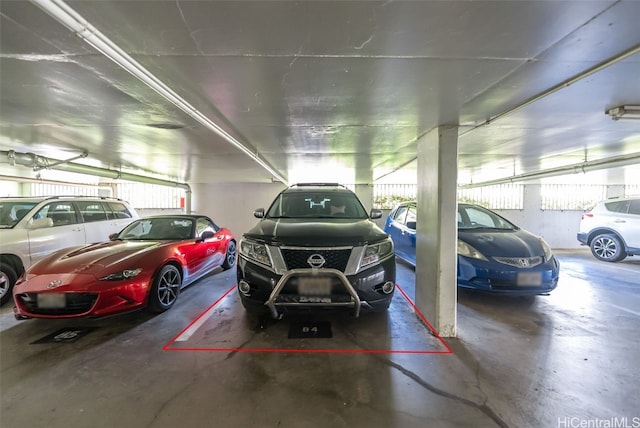 parking deck featuring fence