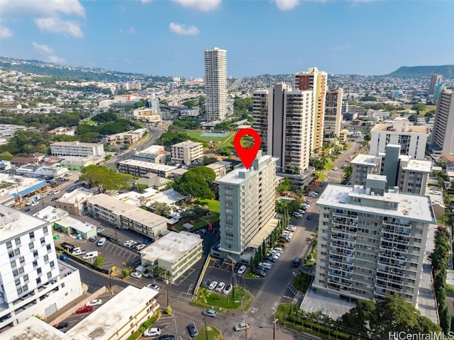 birds eye view of property with a view of city