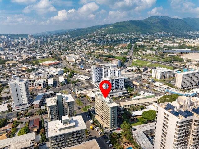 birds eye view of property featuring a mountain view and a city view