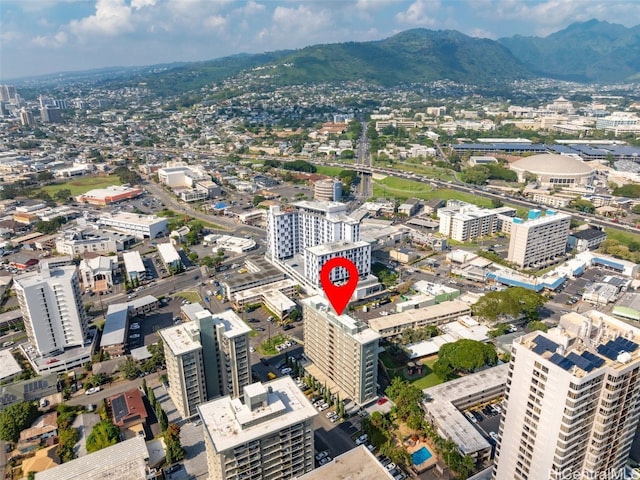 aerial view with a mountain view and a city view