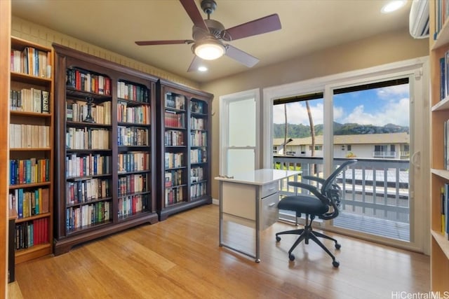 office area featuring ceiling fan and light hardwood / wood-style floors