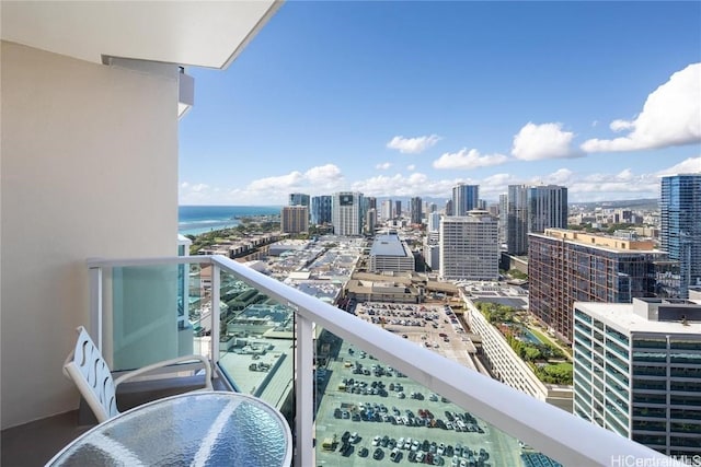 balcony featuring a water view