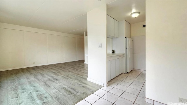 interior space featuring light tile patterned floors