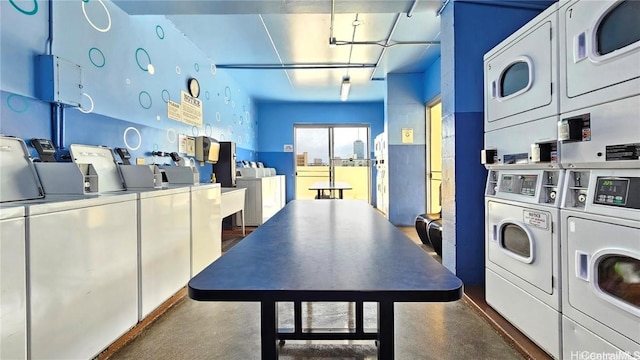 interior space featuring washer and clothes dryer and stacked washer and dryer