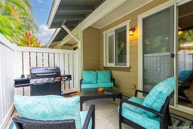 view of patio with an outdoor hangout area and grilling area