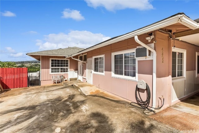 view of property exterior featuring a patio area