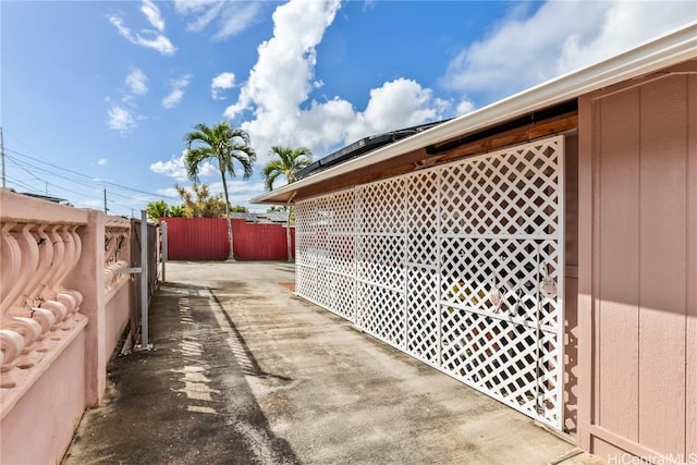 view of side of property featuring a patio area