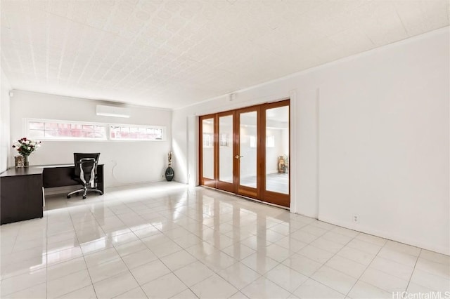 unfurnished room featuring light tile patterned floors, french doors, and a wall mounted AC