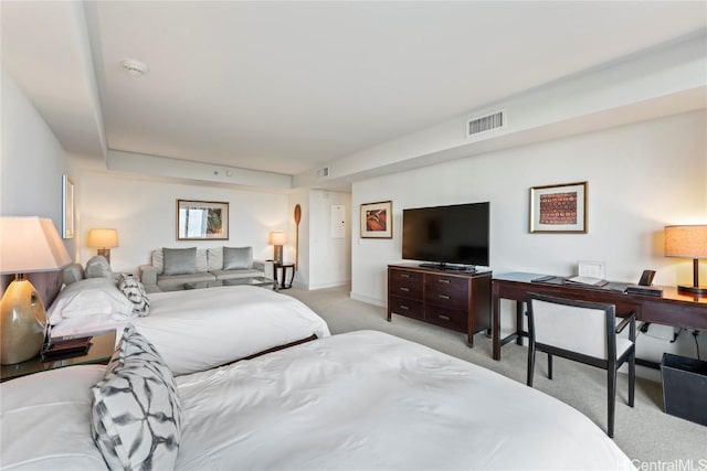 bedroom featuring light colored carpet