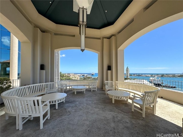 view of patio / terrace featuring a water view