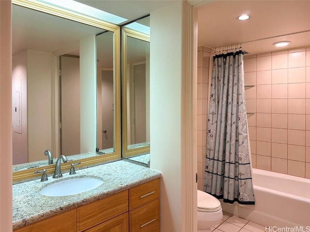 full bathroom featuring tile patterned floors, vanity, toilet, and shower / tub combo with curtain