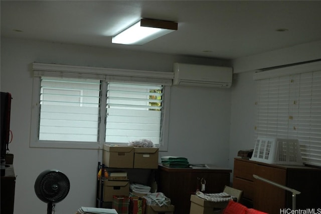 garage with a wall mounted air conditioner