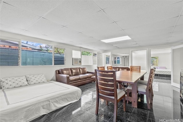 interior space featuring a paneled ceiling