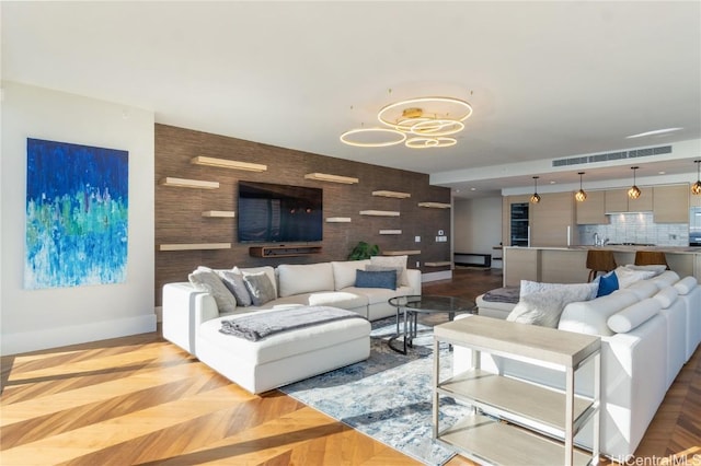 living room with light parquet floors