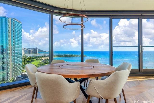 sunroom with a water view