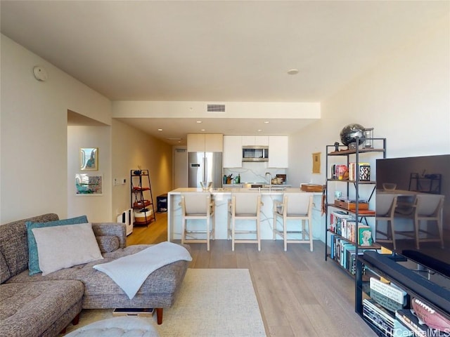 living room featuring light hardwood / wood-style flooring