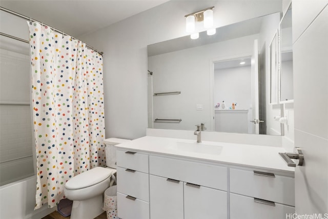 full bathroom featuring vanity, toilet, and shower / bath combo