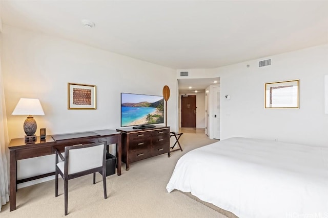 bedroom featuring light colored carpet