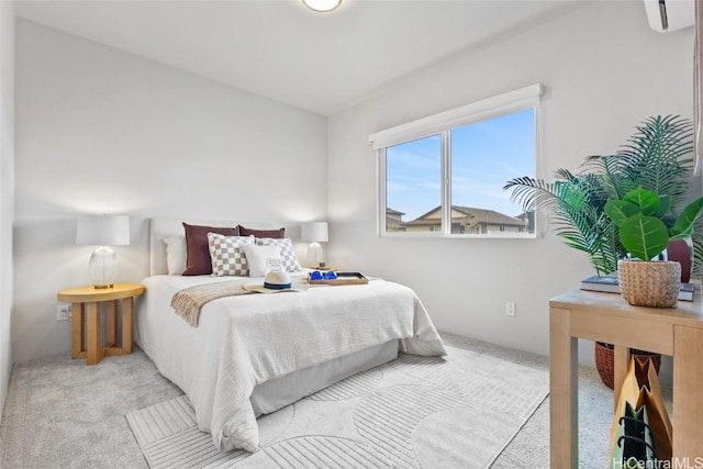 bedroom with light carpet