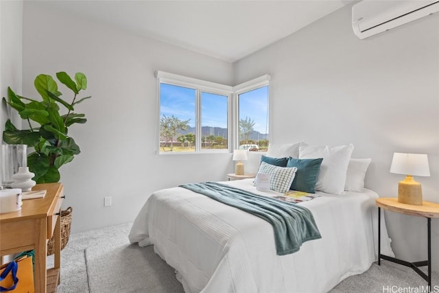 carpeted bedroom featuring a wall unit AC