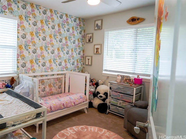 carpeted bedroom featuring ceiling fan