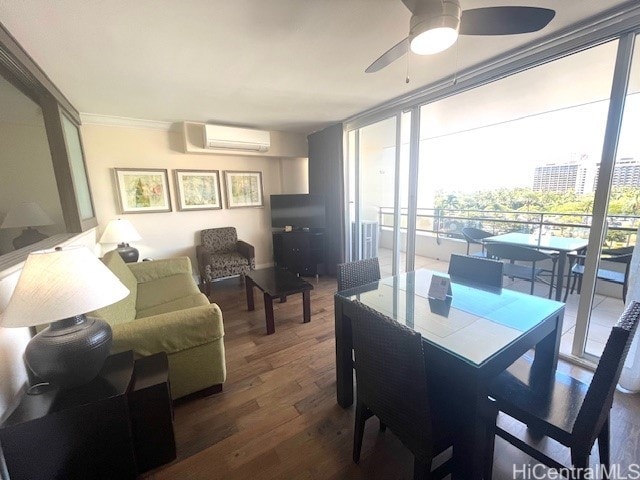 dining space with ceiling fan, a wall mounted air conditioner, floor to ceiling windows, and wood-type flooring