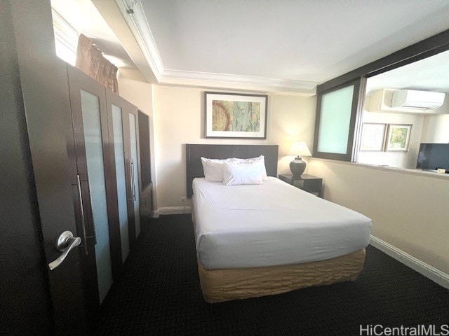 bedroom featuring multiple windows, crown molding, carpet flooring, and a wall mounted air conditioner