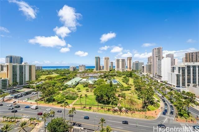 birds eye view of property with a water view