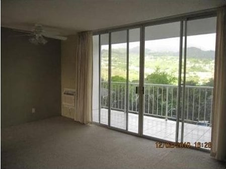 empty room with carpet flooring