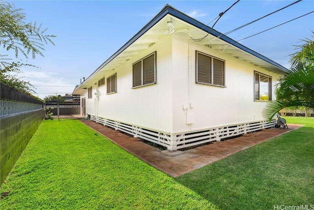 view of property exterior featuring a yard