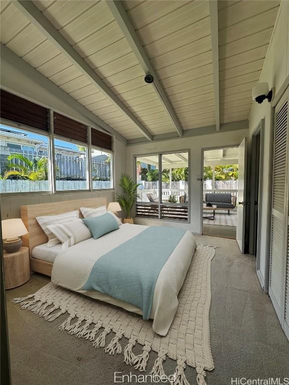 bedroom with carpet floors, vaulted ceiling with beams, and wooden ceiling