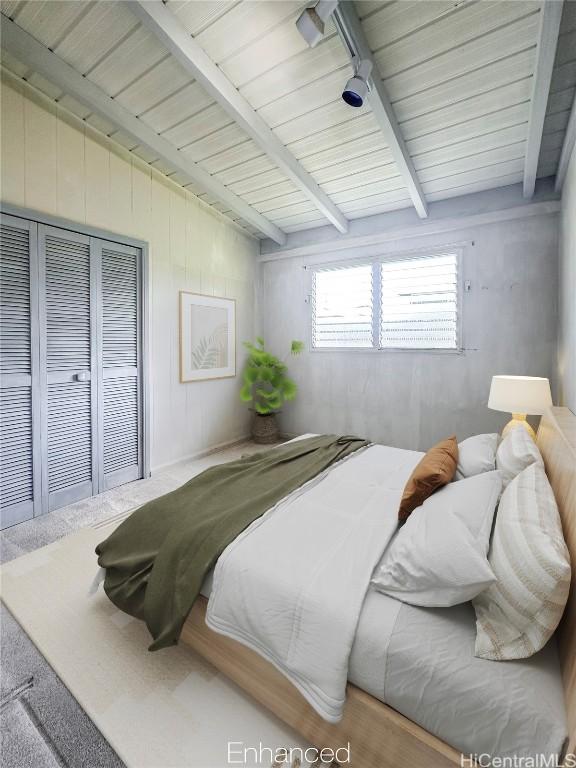 bedroom with vaulted ceiling with beams and wooden ceiling