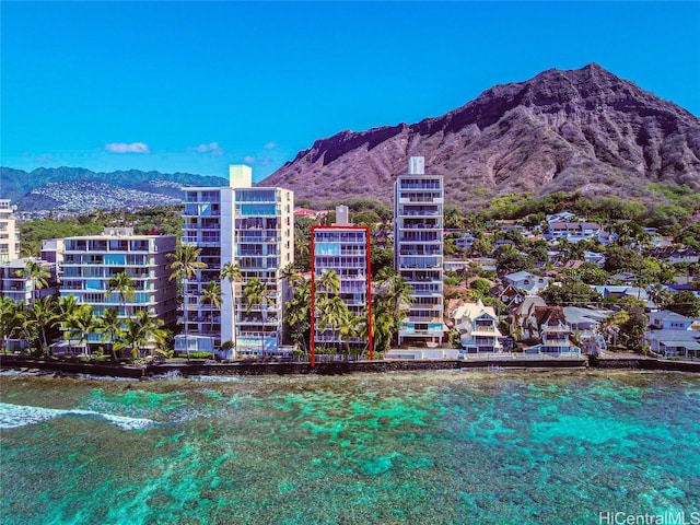 view of building exterior with a mountain view